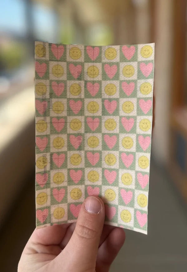 Sonde pleister, smiley's en hartjes.